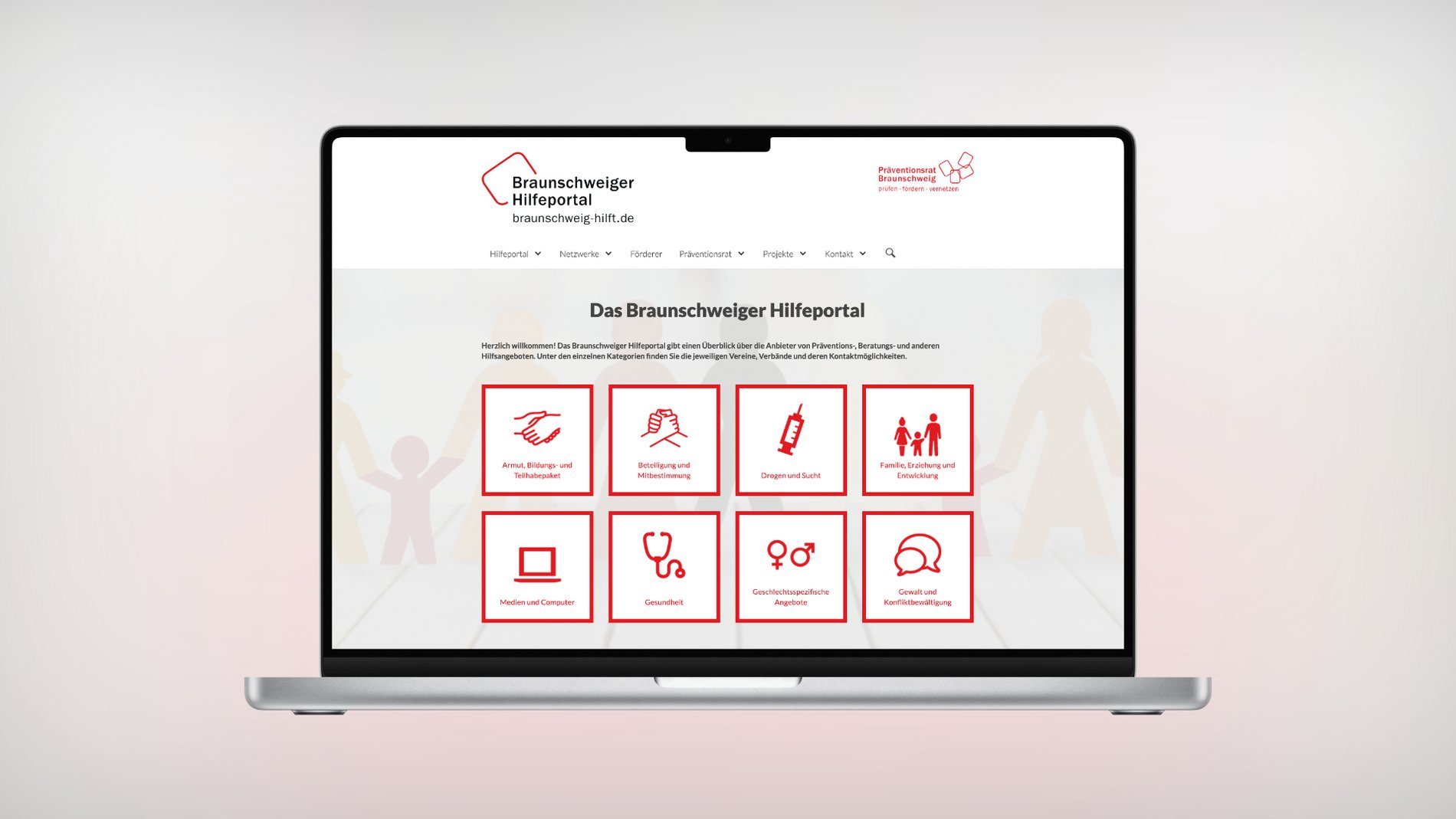 Ein Laptop, der die Startseite der Braunschweig Hilft Website zeigt.